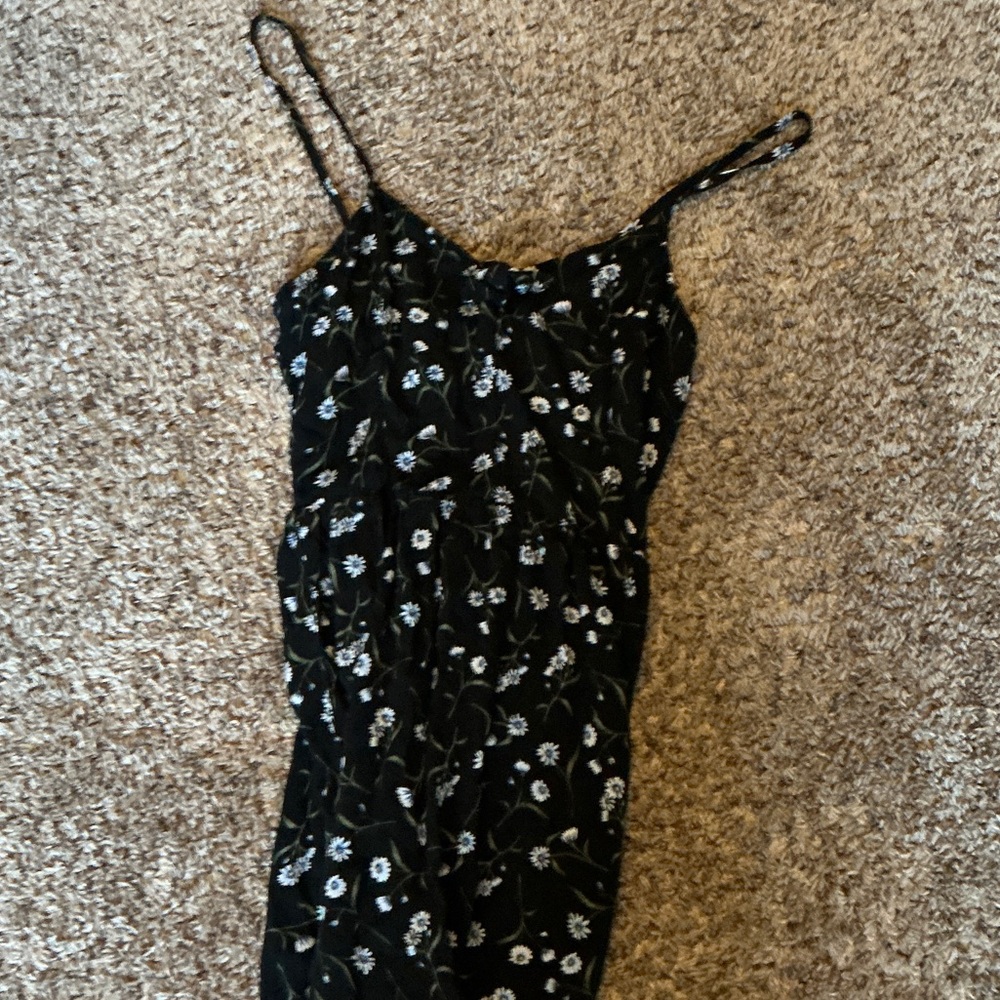 Chic Black Dress with White Floral Design